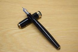 A Parker Vacumatic Oversized fountain pen in Black with broad chevron cap band having Parker
