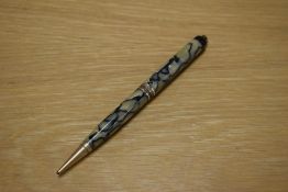 A Parker Duofold ring top propelling pencil in Black and Pearl having three narrow band. One cap