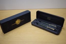 A boxed Parker Duofold International converter fill fountain pen and Rollerball pen in Jade Green