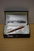 A boxed Conway Stewart 58 lever fill fountain pen 381/023 in Meteor with one wide and two narrow cap
