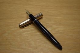 A Parker VP aerometric fill fountain pen in Black with a Rolled Gold cap having a Parker USA nib