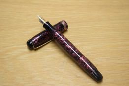 A Parker Televisor Standard button fill fountain pen in rose lined pattern with three narrow gold