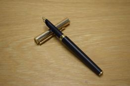 A Parker 95 converter fill fountain pen in Matte Black with gold cap having Parker nib
