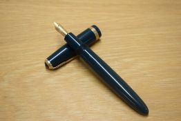 A Parker Duofold Demi aerometric fill fountain pen in green with single gold chevron cap band having