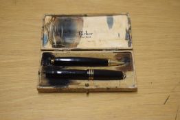 A boxed Parker Lady Vest Pocket button fill fountain pen and Propelling pencil in Black with three