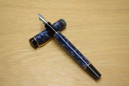 A Parker Duofold International converter fill fountain pen in Blue Marble with five multi coloured