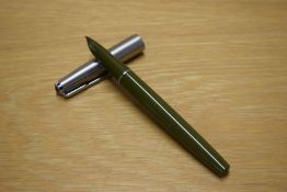 A Parker 51 aerometric fill fountain pen in Olive Green with lustraloy cap