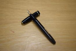 A Conway Stewart Dinkie 550 lever fill fountain pen in Black with a single cap band having Conway