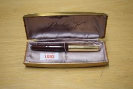 A boxed Parker 51 vacumatic fill fountain pen in Cordovan brown with gold filled blue diamond clip