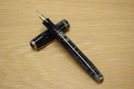 A Parker Vacumatic fountain pen in Emerald Green with three narrow bands to the cap having Parker