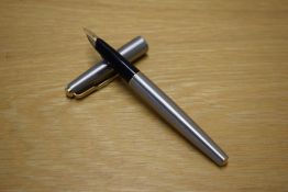 A Parker 65 Flighter Deluxe converter fill fountain pen having 585 14K Parker nib