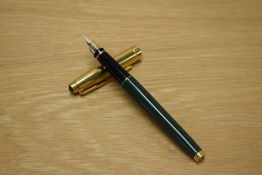 A Parker 75 converter fill fountain pen in Emerald Green with gold cap having Parker 750 18K