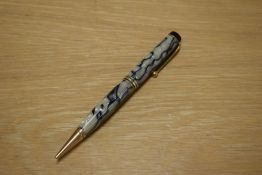 A Parker Duofold propelling pencil in Black and Pearl with three bands