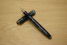 A Parker Vacumatic in Green Pearl with three narrow bands to the cap having Parker Duofold Pen N