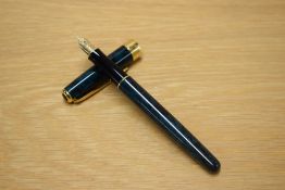 A Parker Sonnet converter fill fountain pen in Laque Premier Green with gold trim having a Parker