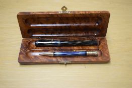 A boxed Parker Duofold True Blue Lucky Curve button fill fountain pen and Propelling pencil in
