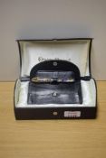 A boxed Conway Stewart Dinkie series cartridge converter fill fountain pen in Tiffany Yellow No554/
