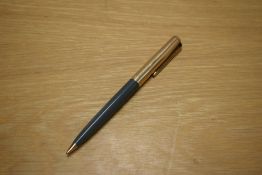 A Parker 51 propelling pencil in grey with rolled gold cap.