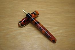 A Conway Stewart Dinkie series cartridge converter fill fountain pen in Meteor No381/017 with two