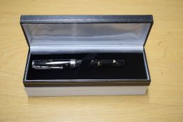 A boxed Sigma converter fill fountain pen in Olive Wood having Iridium Point Germany nib