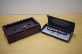 A boxed Parker Duofold Centennial converter fill fountain pen in Pearl Grey with two bands to the