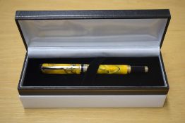 A boxed Sigma converter fill fountain pen in Yellow Swirl having Iridium Point Germany nib
