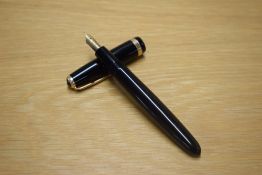 A Parker Duofold aerometric fill fountain pen in Black with a wide decorative cap band having a