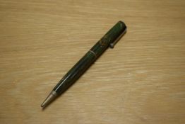 A Parker Moderne propelling pencil in green and gold marble