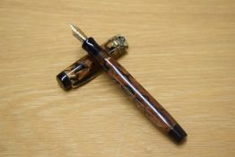 A Parker Duofold Junior button fill fountain pen in Black and Pearl with three narrow cap bands
