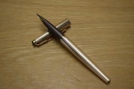 A Parker Falcon converter fill fountain pen in gold