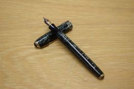 A Parker Vacumatic in Green Pearl with three narrow bands to the cap having Parker 14K England 10