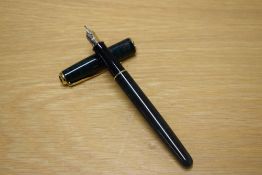 A Parker Sonnet converter fill fountain pen in Laque Forest Green with gold trim having Parker 18K