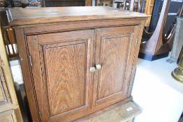 A traditional oak bathroom or similar cabinet, width approx. 60cm