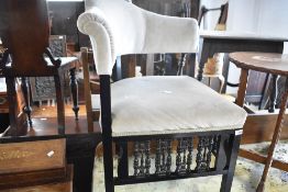 A Victorian corner chair having bobbin style frame and later dralon upholstery