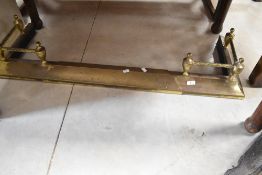 A brass adjustable fire fender