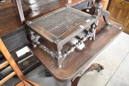 A traditional cane seated footstool, width approx. 41cm
