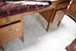 A vintage sapele desk, width approx. 137cm