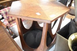 A vintage G plan teak coffee table having hexagonal top , diameter approx. 41cm