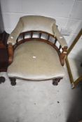 A Victorian mahogany framed low seat tub/nursing chair