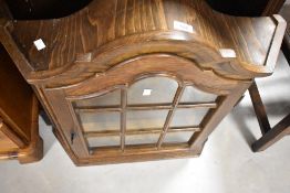 A vintage oak wall mounted display cabinet, width approx. 67cm