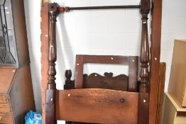 A traditional mahogany tester bed, base width approx. 138cm