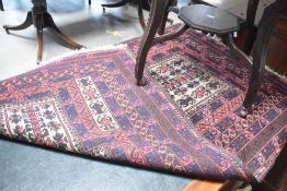 A Persian style rug, approx. 150 x 90cm