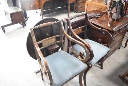 A pair of reproduction scroll arm dining chairs
