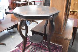 A Victorian mahogany occasional table having octagonal top and inlaid decoration, diameter approx.