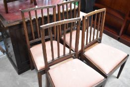 Eleven dining chairs comprising sets of four and three Georgian mahogany and four later reproduction