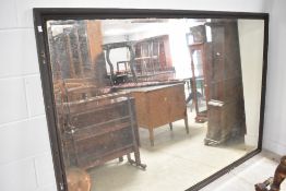 An oversized vintage wall mirror having painted frame, approx. 223 x 148cm