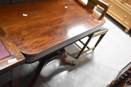 A Regency mahogany fold over tea table, width approx. 91cm