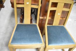 Two mid 20th Century stained frame dining chairs