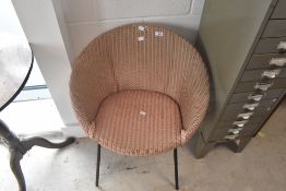 A vintage metal framed Lloyd Loom chair