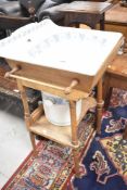 A 19th Century fresh washstand with ceramic basin and cistern, width approx 63cm